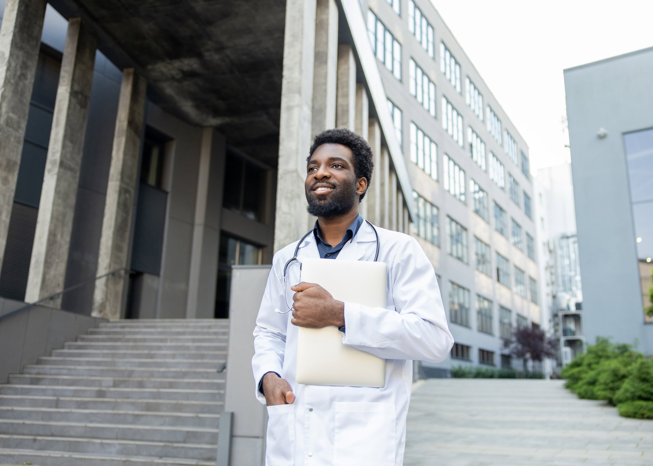 med-student-holding-laptop